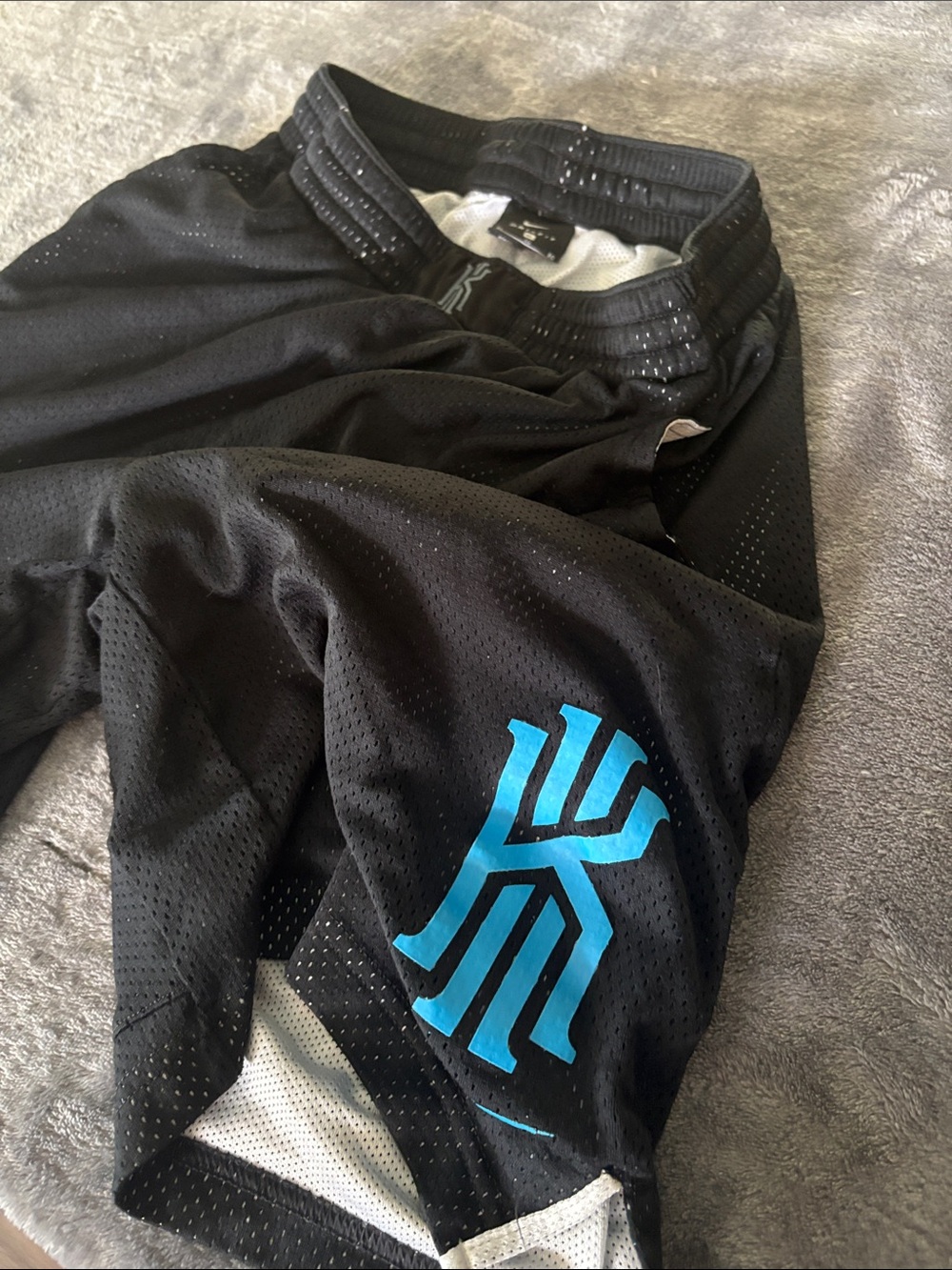 Nike Black Kids Mesh Shorts with Bright Blue Logo